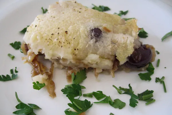 Portugalia | Bacalhau á bras z czarnymi oliwkami Portugalia | Bacalhau á bras z czarnymi oliwkami